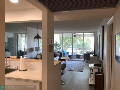 Escape to this stunning 2bedroom, 2bathroom apartment, boasting on Pine Island Ridge Country Club in Florida - for sale on GolfHomes.com, golf home, golf lot
