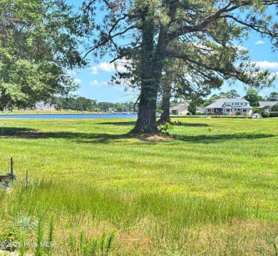 Stunning Waterview Lot Overlooking Scenic Parkland. Discover the on Harbour Point Golf Club in North Carolina - for sale on GolfHomes.com, golf home, golf lot