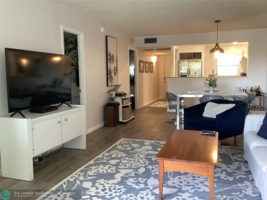 Escape to this stunning 2bedroom, 2bathroom apartment, boasting on Pine Island Ridge Country Club in Florida - for sale on GolfHomes.com, golf home, golf lot
