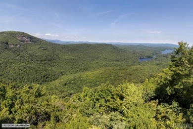 Captivating long-range views of the Blue Ridge Mountains await! on Lake Toxaway Country Club in North Carolina - for sale on GolfHomes.com, golf home, golf lot