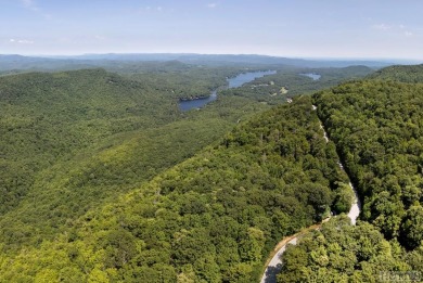 Captivating long-range views of the Blue Ridge Mountains await! on Lake Toxaway Country Club in North Carolina - for sale on GolfHomes.com, golf home, golf lot