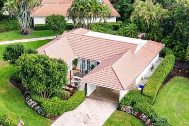 Discover the ultimate blend of elegance and effortless living in on Quail Ridge Golf Course and Country Club in Florida - for sale on GolfHomes.com, golf home, golf lot