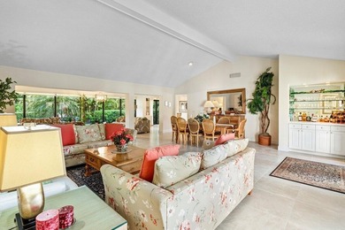 Discover the ultimate blend of elegance and effortless living in on Quail Ridge Golf Course and Country Club in Florida - for sale on GolfHomes.com, golf home, golf lot