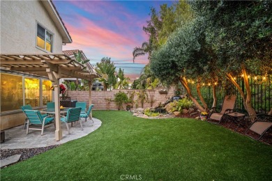 Turquoise double doors welcome you to this cheery 2 story on Wood Ranch Golf Club in California - for sale on GolfHomes.com, golf home, golf lot
