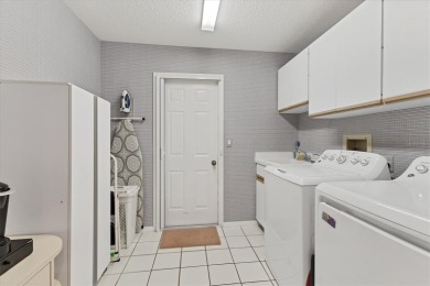 Located in Waterford, a gated, golfing, tennis community within on Waterford Golf Club in Florida - for sale on GolfHomes.com, golf home, golf lot