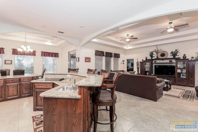 Located in the sought-after SPIGCC, this gorgeous home offers a on South Padre Island Golf Club in Texas - for sale on GolfHomes.com, golf home, golf lot