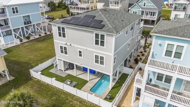 Luxurious Island Living in Sunset Beach: A Stunning 6-Bedroom, 6 on Oyster Bay Golf Links in North Carolina - for sale on GolfHomes.com, golf home, golf lot