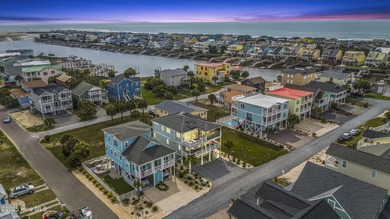 Luxurious Island Living in Sunset Beach: A Stunning 6-Bedroom, 6 on Oyster Bay Golf Links in North Carolina - for sale on GolfHomes.com, golf home, golf lot