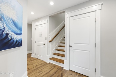 Luxurious Island Living in Sunset Beach: A Stunning 6-Bedroom, 6 on Oyster Bay Golf Links in North Carolina - for sale on GolfHomes.com, golf home, golf lot