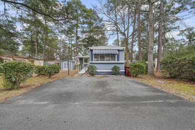 Tucked inside the charming Ocean Pines 55+ community in Murrells on Indigo Creek Golf Club in South Carolina - for sale on GolfHomes.com, golf home, golf lot