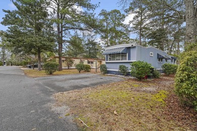 Tucked inside the charming Ocean Pines 55+ community in Murrells on Indigo Creek Golf Club in South Carolina - for sale on GolfHomes.com, golf home, golf lot