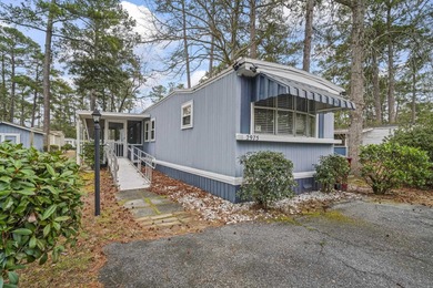 Tucked inside the charming Ocean Pines 55+ community in Murrells on Indigo Creek Golf Club in South Carolina - for sale on GolfHomes.com, golf home, golf lot