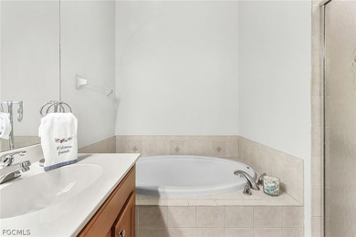 Enjoy the comfort and convenience of ground-floor living in on Spanish Wells Golf and Country Club in Florida - for sale on GolfHomes.com, golf home, golf lot