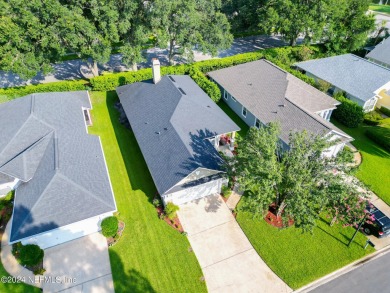 Welcome Home. The Windsor Park Golf Club surrounds this serene on Windsor Parke Golf Club in Florida - for sale on GolfHomes.com, golf home, golf lot