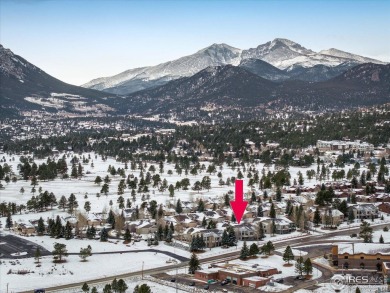 Located in sought after Elk Ridge, this golf course community is on Estes Park Golf Course in Colorado - for sale on GolfHomes.com, golf home, golf lot