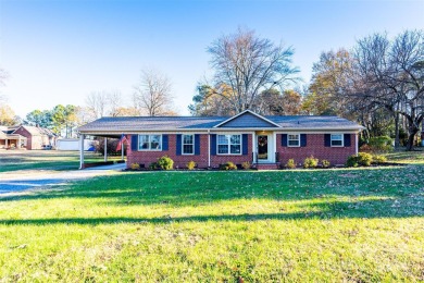 Step inside this charming 1960 brick ranch home located in on Cherryville Golf and  Country Club in North Carolina - for sale on GolfHomes.com, golf home, golf lot