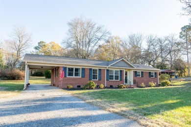 Step inside this charming 1960 brick ranch home located in on Cherryville Golf and  Country Club in North Carolina - for sale on GolfHomes.com, golf home, golf lot