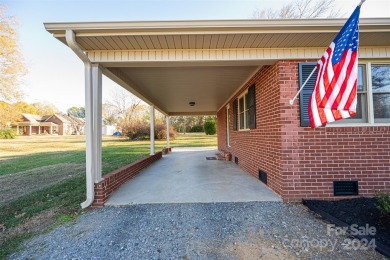 Step inside this charming 1960 brick ranch home located in on Cherryville Golf and  Country Club in North Carolina - for sale on GolfHomes.com, golf home, golf lot