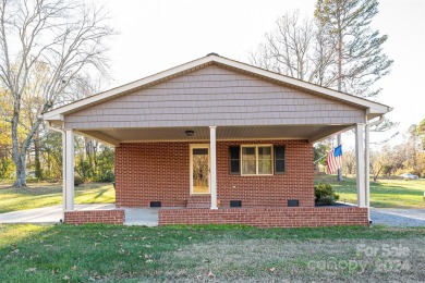 Step inside this charming 1960 brick ranch home located in on Cherryville Golf and  Country Club in North Carolina - for sale on GolfHomes.com, golf home, golf lot