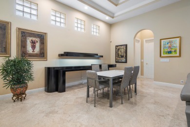 Elegant 4-bedroom, 5.1-bath home nestled on the picturesque on Mizner Country Club in Florida - for sale on GolfHomes.com, golf home, golf lot