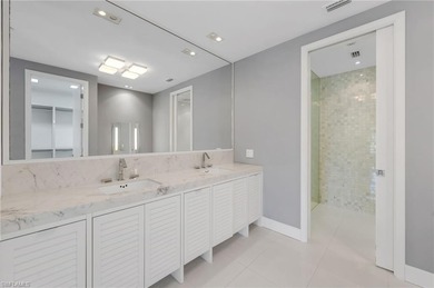 Gallery-inspired design meets effortless livability in this on Bonita Bay West in Florida - for sale on GolfHomes.com, golf home, golf lot