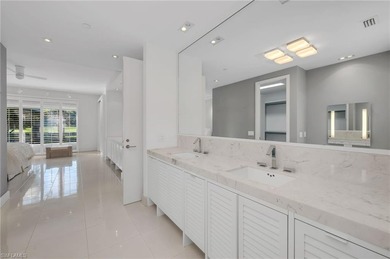 Gallery-inspired design meets effortless livability in this on Bonita Bay West in Florida - for sale on GolfHomes.com, golf home, golf lot