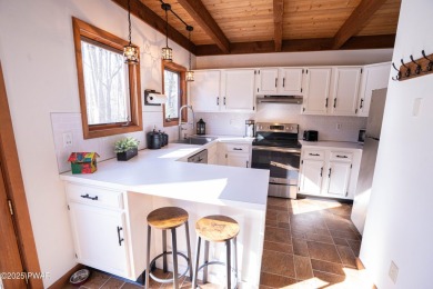 Your Perfect Pocono Escape Awaits!Step into this stunning, fully on The Hideout Golf in Pennsylvania - for sale on GolfHomes.com, golf home, golf lot