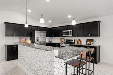 Step inside this beautifully updated Deer Island home, where on Deer Island Country Club in Florida - for sale on GolfHomes.com, golf home, golf lot