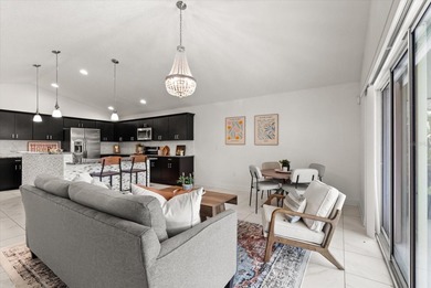 Step inside this beautifully updated Deer Island home, where on Deer Island Country Club in Florida - for sale on GolfHomes.com, golf home, golf lot