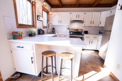 Your Perfect Pocono Escape Awaits!Step into this stunning, fully on The Hideout Golf in Pennsylvania - for sale on GolfHomes.com, golf home, golf lot