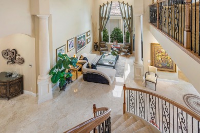 Elegant 4-bedroom, 5.1-bath home nestled on the picturesque on Mizner Country Club in Florida - for sale on GolfHomes.com, golf home, golf lot