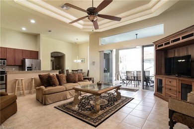 This spacious Courtyard Home is located in the exclusive Gated on Spanish Wells Golf and Country Club in Florida - for sale on GolfHomes.com, golf home, golf lot
