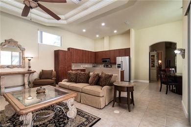 This spacious Courtyard Home is located in the exclusive Gated on Spanish Wells Golf and Country Club in Florida - for sale on GolfHomes.com, golf home, golf lot