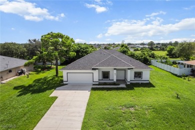 Stunning brand new modern home offering 3 bedrooms plus a on Del Tura Golf and Country Club in Florida - for sale on GolfHomes.com, golf home, golf lot