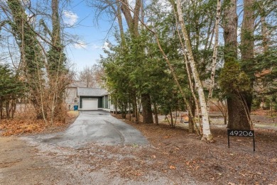 Welcome home to this lovely 4-bedroom, 2 freshly renewed on Grand Beach Municipal Golf Course in Michigan - for sale on GolfHomes.com, golf home, golf lot