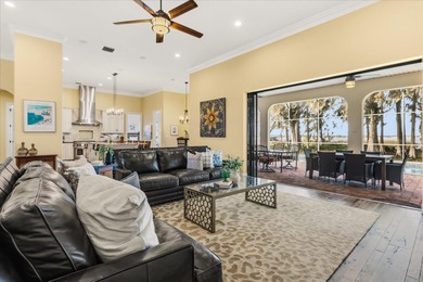 Set along approximately 82 feet of shimmering Lake Dora on Deer Island Country Club in Florida - for sale on GolfHomes.com, golf home, golf lot