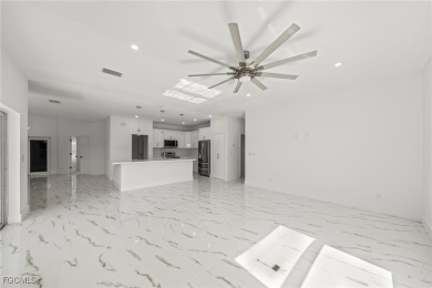 Stunning brand new modern home offering 3 bedrooms plus a on Del Tura Golf and Country Club in Florida - for sale on GolfHomes.com, golf home, golf lot