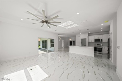 Stunning brand new modern home offering 3 bedrooms plus a on Del Tura Golf and Country Club in Florida - for sale on GolfHomes.com, golf home, golf lot
