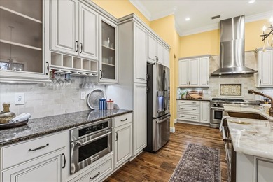 Set along approximately 82 feet of shimmering Lake Dora on Deer Island Country Club in Florida - for sale on GolfHomes.com, golf home, golf lot