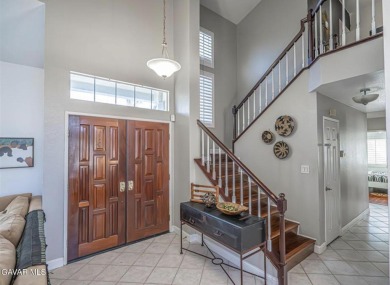 Prepare to be captivated by this charming two-story gem nestled on Rancho Vista Golf Course in California - for sale on GolfHomes.com, golf home, golf lot