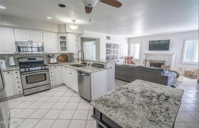 Prepare to be captivated by this charming two-story gem nestled on Rancho Vista Golf Course in California - for sale on GolfHomes.com, golf home, golf lot