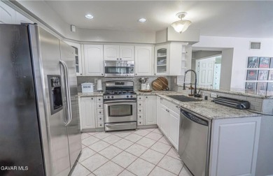 Prepare to be captivated by this charming two-story gem nestled on Rancho Vista Golf Course in California - for sale on GolfHomes.com, golf home, golf lot
