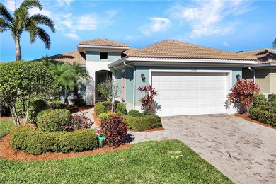 Immaculate lakefront San Remo floor plan home built by WCI on Pelican Preserve Golf Club in Florida - for sale on GolfHomes.com, golf home, golf lot