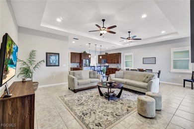 Immaculate lakefront San Remo floor plan home built by WCI on Pelican Preserve Golf Club in Florida - for sale on GolfHomes.com, golf home, golf lot