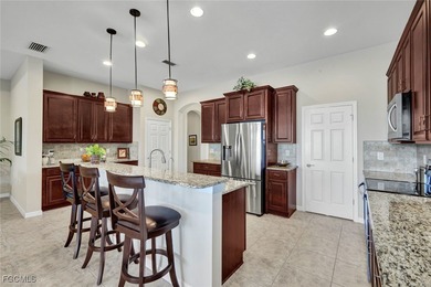 Immaculate lakefront San Remo floor plan home built by WCI on Pelican Preserve Golf Club in Florida - for sale on GolfHomes.com, golf home, golf lot