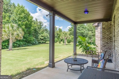 Welcome to 1405 Rainey Way - A Cul-de-Sac Gem in Crystal Lake on Crystal Lake Golf and Country Club in Georgia - for sale on GolfHomes.com, golf home, golf lot