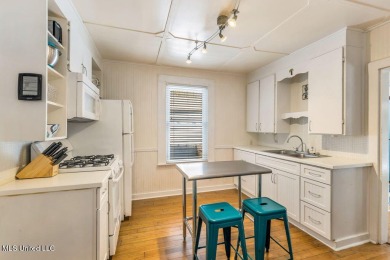 MUST SEE this charming Old Town Bay St Louis cottage with pool! on The Bridges Golf Club At Hollywood Casino in Mississippi - for sale on GolfHomes.com, golf home, golf lot