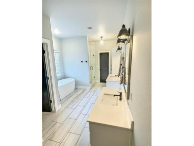 Complete remodel on .32-acre with an in-ground, salt-water on Bailey Ranch Golf Club in Oklahoma - for sale on GolfHomes.com, golf home, golf lot