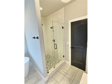 Complete remodel on .32-acre with an in-ground, salt-water on Bailey Ranch Golf Club in Oklahoma - for sale on GolfHomes.com, golf home, golf lot