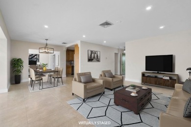 Waterfront Gem with Unmatched Golf & Lake Views!Discover the on Atlantis Golf Club in Florida - for sale on GolfHomes.com, golf home, golf lot